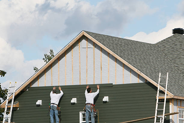 Professional Siding Replacement technician working in Doylestown, OH